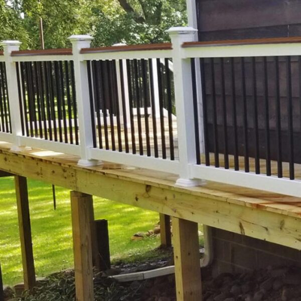 Halton White vinyl railing on pine deck