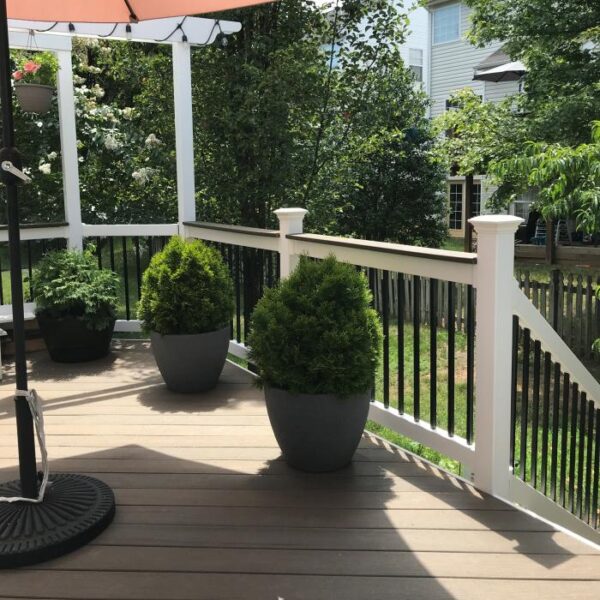 Halton White vinyl railing with potted plants