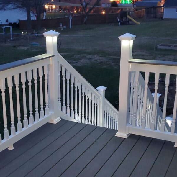 Hastings white vinyl railing with led post caps