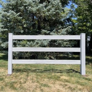 3 rail coastal grey woodgrain ranch rail in the sunlight